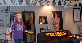 Eve, played by Taylor Boles, left, makes herself at home in Adam's apartment, right, played by Kenny Griggs.
