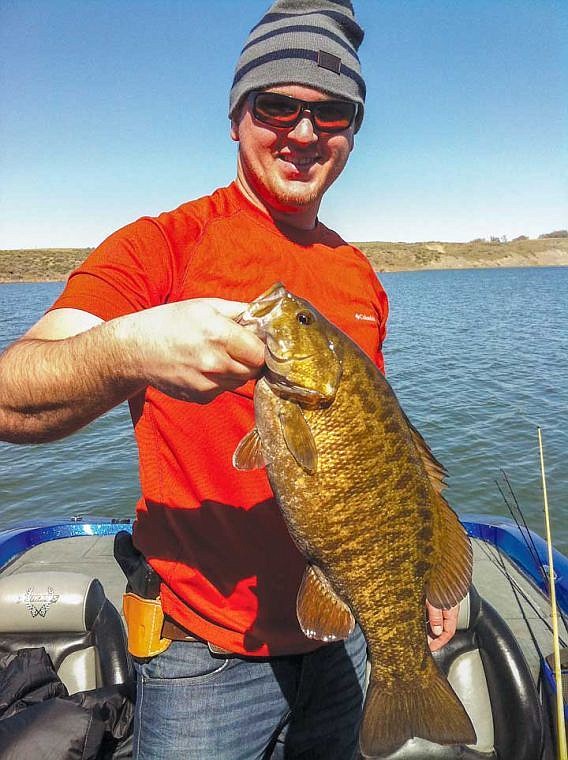 Zack Cooper, of Moses Lake, caught this nice Bass off the rock piles on Potholes Reservoir. This fish was released.