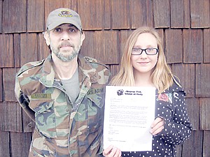 &lt;p&gt;Cerria Swagger and her father, Bill, have hunted black bears. In 2013, Cerria will have her own tag for the first time. In the photo, Cerria holds a letter acknowledging her certification to teach bow-huning classes.&lt;/p&gt;