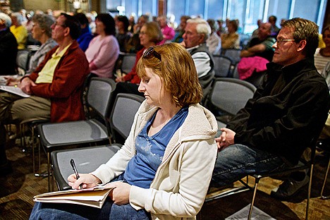 &lt;p&gt;Corinne Dickinson takes notes during a presentation David Gray Adler's &quot;Holding Government Accountable&quot; presentation.&lt;/p&gt;