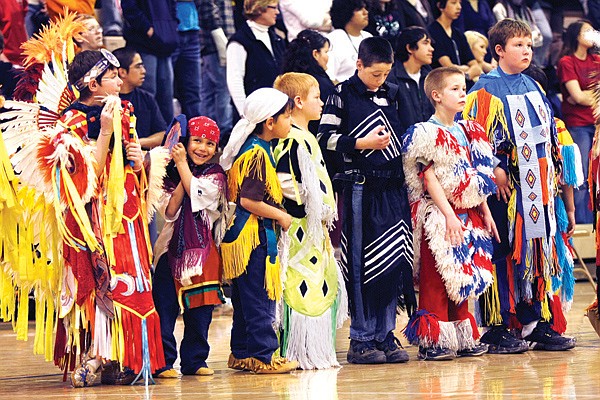 Mission Elementary students line up during the K-12 grade Mission powwow on April 9 in the Mission High School gymnasium.