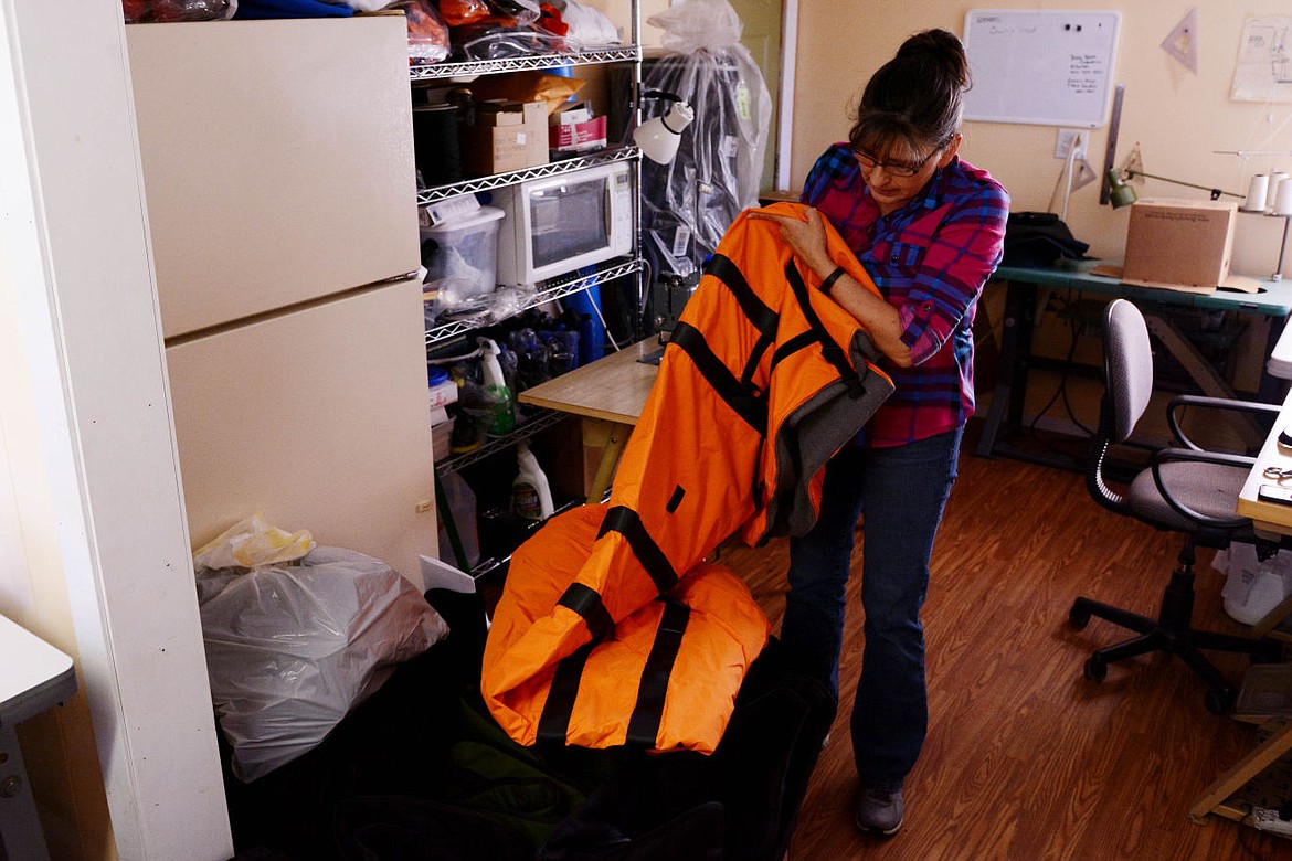 &lt;p&gt;Orr unfolds one of the products she made for local business, Doctor Down. These bags are used to keep people on medical stretchers warm during transportation to a hospital. The bags are used by medical professionals around the country and are even stashed on AirForce One.&lt;/p&gt;