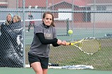 Polson tennis shakes rust, looks strong
