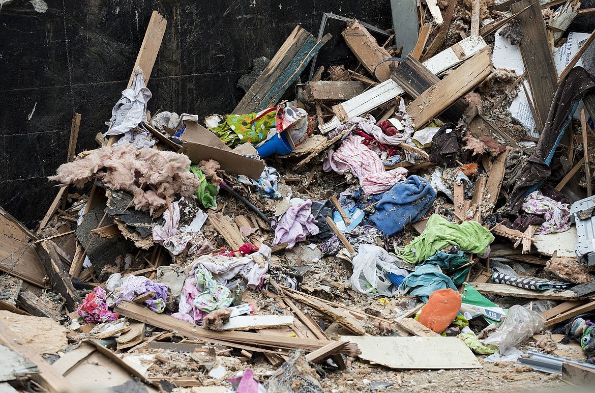 &lt;p&gt;Clothing rests in the rubble of one of the demolished Cedar Motel and RV Park buildings on Tuesday.&lt;/p&gt;