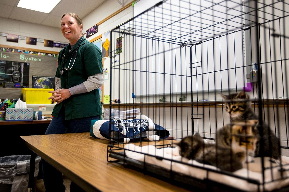 &lt;p&gt;With three calico kittens on a table beside her, veterinarian Nichole Leonard laughs as she answers questions posed by Ramsey Elementary third-graders on Wednesday at the school's annual Science Cafe.&lt;/p&gt;