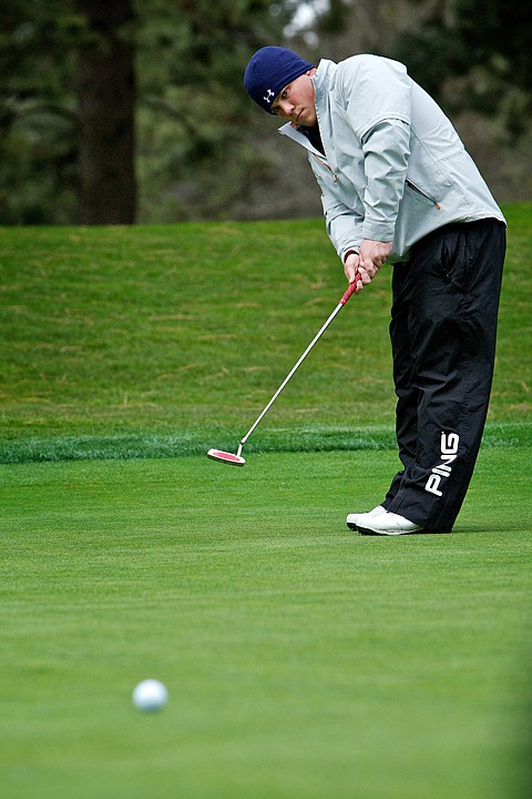 &lt;p&gt;Lake City High's Kevin Porto keeps his eye on the ball as it breaks toward the cup.&lt;/p&gt;