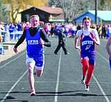 Boys win home track meet