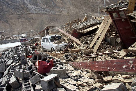 &lt;p&gt;In this photo released by China's Xinhua News Agency, a car is buried under the rubble after an earthquake in Yushu County, northwest China's Qinghai Province, Wednesday, April 14, 2010. A series of strong earthquakes struck a mountainous Tibetan area of western China on Wednesday, killing hundreds of people and injuring more than 10,000 as houses made of mud and wood collapsed, officials said. (AP Photo/Xinhua, Ren Xiaogang)&lt;/p&gt;