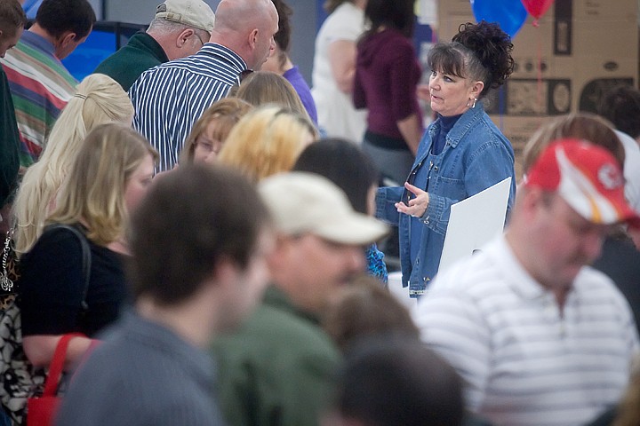 &lt;p&gt;Becky Savage, senior secretary of Kootenai County human resources, speaks to attendees of the job fair Wednesday afternoon at the Kootenai County Fairgrounds in Coeur d'Alene.&lt;/p&gt;