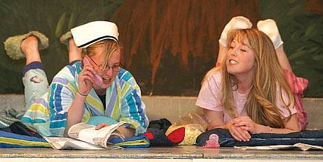 Photos by Nick Ianniello Ally Briscoe (right) as Juliet and Abby Taylen as her nurse talk on the phone with Romeo during Thursday Night&#146;s Presentation of &#147;The Shakespeare Project.&#148; The Alberton Drama Club put on the play twice Thursday, once for the school and again in the evening for a the community. The students used their own props costumes and designs