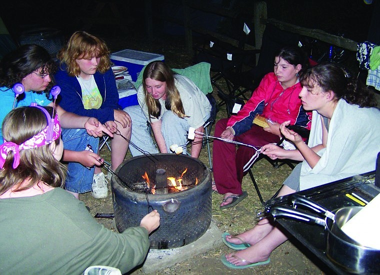 &lt;p&gt;Girl Scouts roast marshmallows during a trip to Silverwood in 2006.&lt;/p&gt;