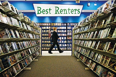 &lt;p&gt;A customer scans the rentals offerings while walking through Hasting's new release DVD section.&lt;/p&gt;