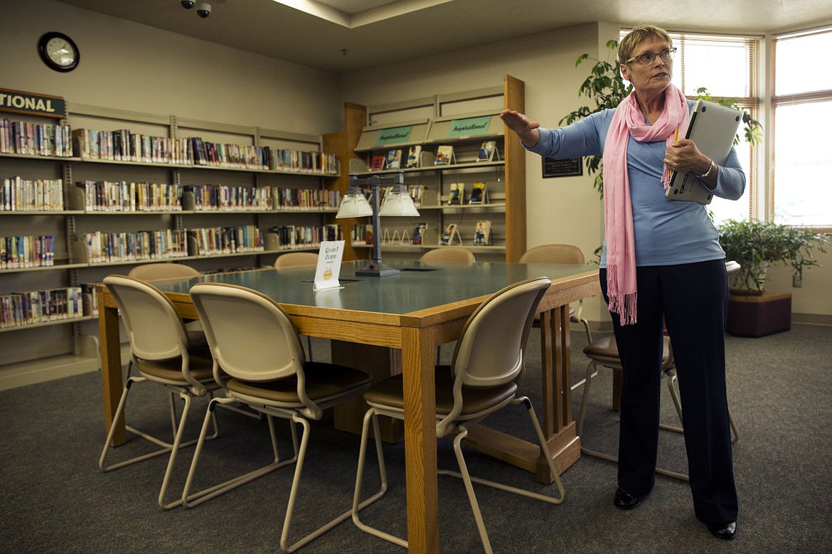 &lt;p&gt;Anne Abrams, administrator for community resources of the Community Library Network, explains where new semi-private booths could go within the library's quiet area if the library levy passes. The levy, spread over three years, is estimated to cost $16.65 per year for taxpayers with a home valued at $200,000. The levy includes a &quot;hang out&quot; area for teenagers, new shelves, a circulation desk and a technology room.&lt;/p&gt;