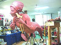 This mermaid is one of the sculptures that Kim Graham has worked on. Graham has also done sculpting demonstrations inside of malls where a large chunk of clay is brought in and she teaches people how to use tools.