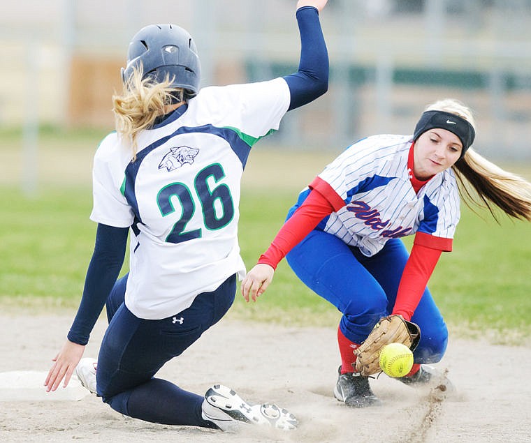 &lt;p&gt;Glacier's Hannah Atlee (26) slides safely into second base as Columbia Falls' Lauren Fields (right) makes a play on the ball Friday afternoon during Glacier's 5-3 win over Columbia Falls at Kidsports Complex. April 12, 2013 in Kalispell, Montana. (Patrick Cote/Daily Inter Lake)&lt;/p&gt;