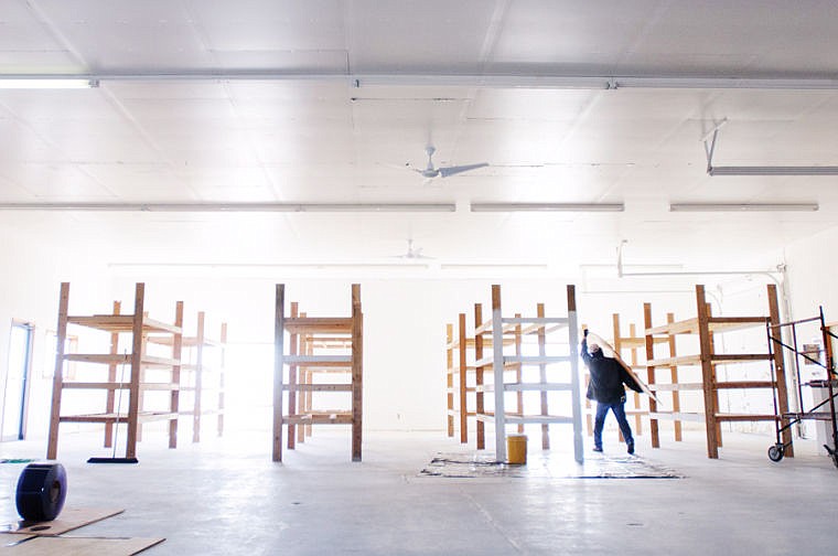 &lt;p&gt;Jack Stephens puts up shelving Tuesday afternoon at the new location of the Habitat for Humanity ReStore. The new store at 2610 U.S. 93 South is expected to open on April 22.&lt;/p&gt;