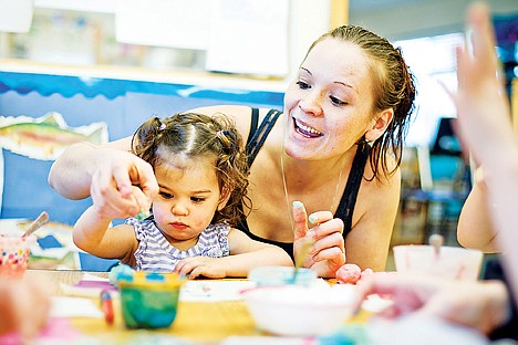 &lt;p&gt;Malina Lenard works with her 20-month-old daughter Aaris Miller with a craft project at Post Falls Head Start last Friday during a bi-monthly parenting class, Circle of Parents, hosted by ICARE.&lt;/p&gt;