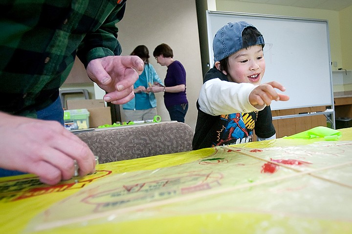 &lt;p&gt;JULIA MOORE/Press Alex Kubodera, 5, constructs a kite during a kite-making workshop held at the Post Falls Public Library Friday afternoon. Gary Kubodera, a kite enthusiast, will be holding his next workshop Saturday, April 17, at 10:30a.m. at the Coeur d'Alene Public Library. The workshop is free of charge and open to the public.&lt;/p&gt;