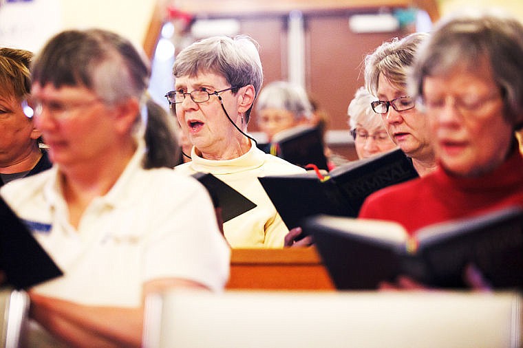 <p>Alto Sue Sande sings during an April 11 rehearsal for the Columbia Falls Community Choir at the United Methodist Church in Columbia Falls.</p>