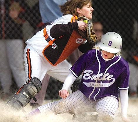 Chris Jordan/Daily Inter Lake&lt;br&gt;Flathead High School junior catcher Julie Robertson forces out Butte's Brianna Shaffer during Flathead's 9-6 victory &lt;br&gt;in the second game of a Saturday afternoon doubleheader at the Conrad Complex. Flathead also won the first game, 5-3.