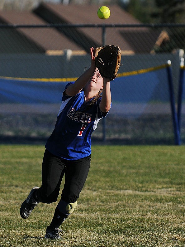 <p>Columbia Falls' outfielder Katie Price hauls in a pop fly. (Aaric Bryan/Daily Inter Lake)</p>