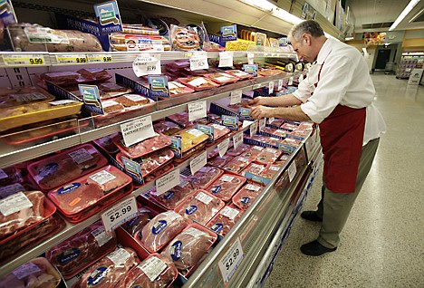 &lt;p&gt;Meat department manager Kevin Morlan arranges packages of pork at a local Dah'ls grocery store in Des Moines, Iowa, on March 3. Consumer prices rose 0.5 percent last month, the Labor Department said Friday. Nearly all the gains came from pricier&lt;/p&gt;