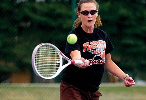 Chelsie Steller, a Flathead senior, makes a return against St. Ignatius junior Staci Udall during Monday&#146;s tennis dual at the courts at Flathead Valley Community College. Steller won at No. 2 singles, 6-1, 6-4. Jennifer DeMonte/Daily Inter Lake