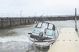 Boats beached by Saturday's storm