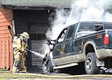 Pickup bursts into flames, chars home