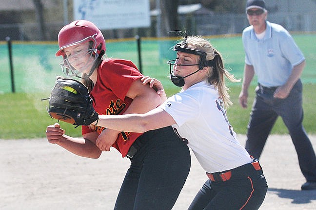 &lt;p&gt;Flathead second baseman Hailey Gauthier catches the ball behind Missoula Hellgate's Sierrah Hardy on a pick off attempt at first. (Aaric Bryan/Daily Inter Lake)&lt;/p&gt;