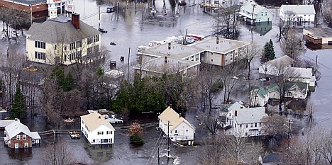 &lt;p&gt;FILE - In this March 31, 2010 file photo, water encircles homes from the flooded Pawtuxet River in West Warwick, R.I. Many people trying to buy a house with a riverfront view were up a creek the past few weeks because of the temporary shutdown of the federal program that provides flood insurance. (AP Photo/Charles Krupa, File)&lt;/p&gt;