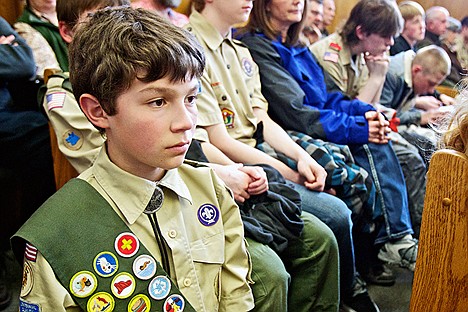 &lt;p&gt;Scott Kennedy, a boy scout with Troop 201, kneels on the floor between the gallery benches Tuesday while listening to attorneys discuss the legality of trading or selling the land which comprises Camp Easton on Lake Coeur d'Alene.&lt;/p&gt;