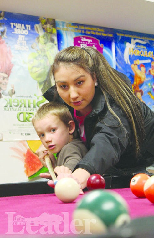 &lt;p&gt;Hunter Lytton is coached on how to take the best shot by part-time staffer Aimee Dixon at the Boys &amp; Girls Club of the Flathead Reservation and Lake County's Polson club last week.&lt;/p&gt;