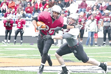 &lt;p&gt;Tailback Marlon Miles breaks a tackle last Saturday in Ronan.&lt;/p&gt;