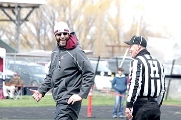 &lt;p&gt;Assistant coach Scott Gragg jokes with a ref during Saturday's scrimmage in Ronan.&lt;/p&gt;