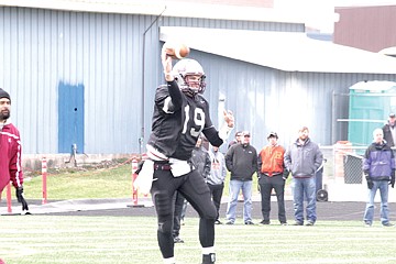 &lt;p&gt;Quarterback Shay Smithwick-Hann throws a screen pass in Ronan last Saturday.&lt;/p&gt;