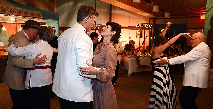 <p>Couples take to the dance floor following the Moroccan-themed feast at the Flathead Valley Community College spring fundraiser "Casablanca the Dinner" on Saturday, April 12, in Kalispell. Live music for the event was provided by Erica von Kleist with the Gringos Del Soul Trio. (Brenda Ahearn/Daily Inter Lake)</p>