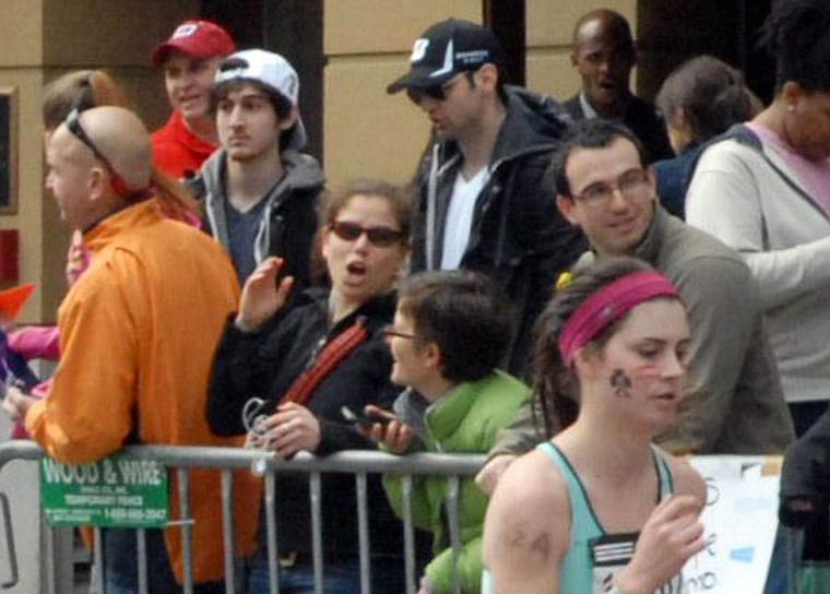 &lt;p&gt;This Monday, April 15, 2013, photo provided by Bob Leonard shows bombing suspects Tamerlan Tsarnaev and his brother Dzhokhar A. Tsarnaev (in white cap) at the Boston Marathon. This image was taken approximately 10 to 20 minutes before the blasts. (AP Photo/Bob Leonard)&lt;/p&gt;