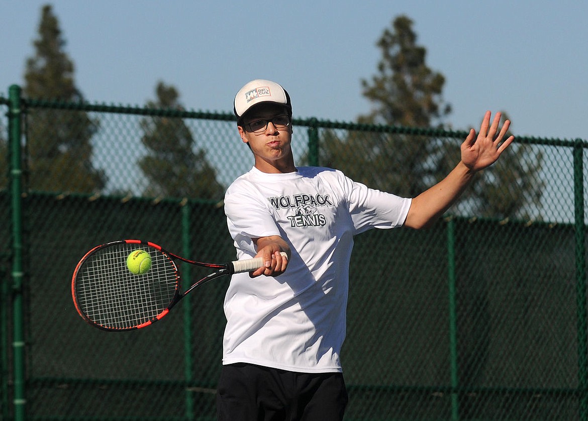 &lt;p&gt;Glacier's Holland Blalack smashes a return against Flathead's Ryan Keenan at Flathead Valley Community College on Tuesday. (Aaric Bryan/Daily Inter Lake)&lt;/p&gt;