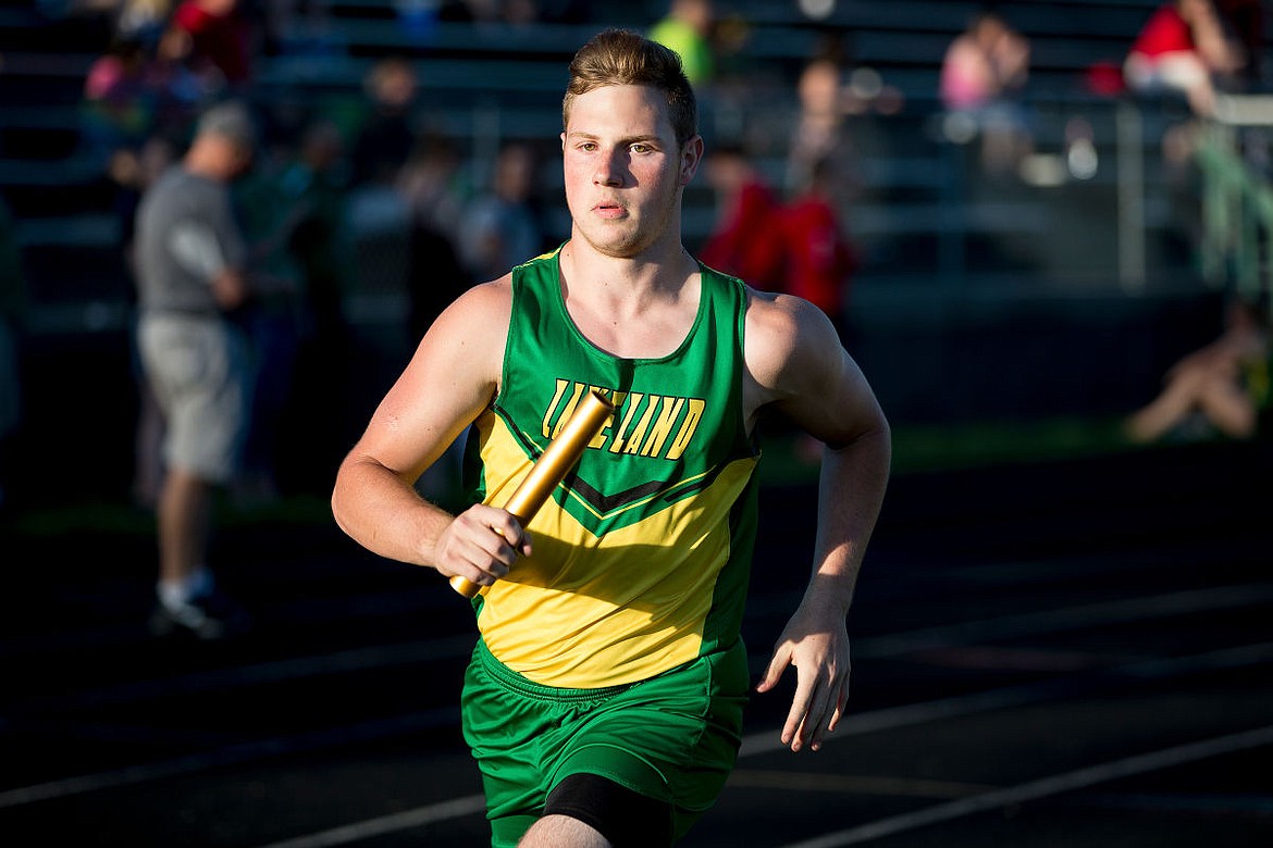 &lt;p&gt;JAKE PARRISH/Press Lakeland sophomore Dylan Thomas sprints his leg of the 800-meter relay on Tuesday at the Lakeland Twilight Relays track meet at Lakeland High School.&lt;/p&gt;