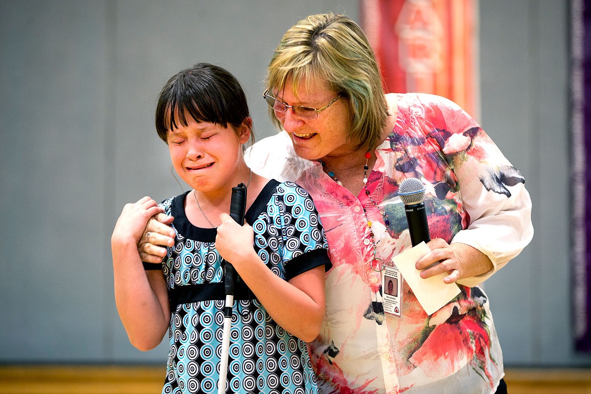 &lt;p&gt;Emma Erckenbrack is overcome with emotion after Tina Johnson announced on Tuesday at Prairie View Elementary that Emma won first place in her age group in the Idaho Regional Braille Challenge. Emma, who is blind, received the award for her excellence in reading, proof-reading and writing Braille.&lt;/p&gt;