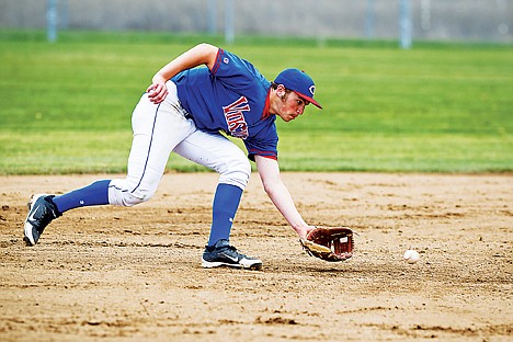 &lt;p&gt;Nick Nyquist, shortstop for the Coeur d'Alene Vikings, fields a ground ball in the second inning against Post Falls.&lt;/p&gt;