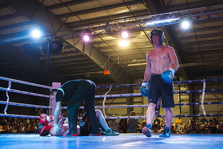 &lt;p&gt;Patrick Cote/Daily Inter Lake Glacier's Tyson Hubbard walks away after knocking Flathead's Robert Heavilin to the mat Thursday evening during the third annual Crosstown Smoker at the Flathead County Fairgrounds.&lt;/p&gt;