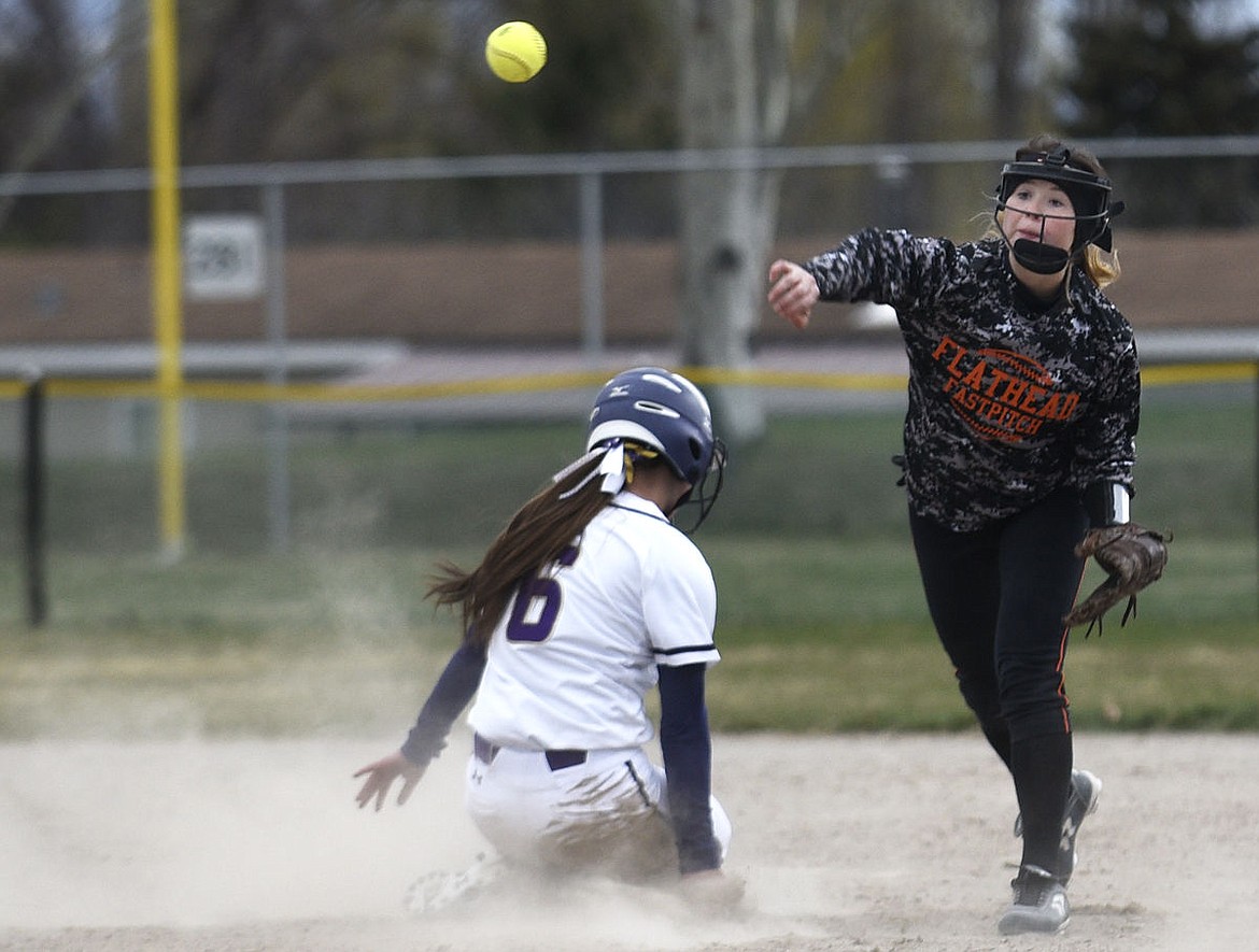 &lt;p&gt;Flathead shortstop Abbie O'Brien fires to first base as Polson's Laurel Bitterman (6) slides into second during an attempt at a double play in this file photo. (Aaric Bryan/Daily Inter Lake)&lt;/p&gt;