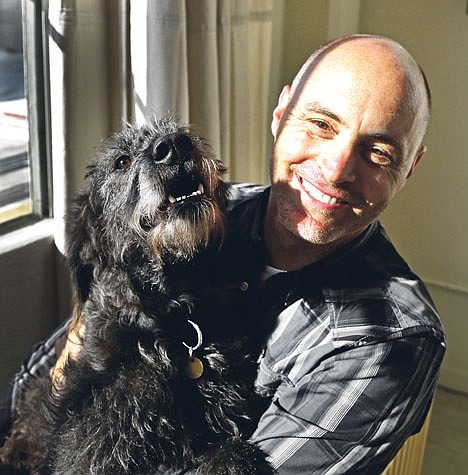 &lt;p&gt;Martin Sprouse with 'Grady', an Airedale Terrier-Irish Wolfhound mix, Thursday in Oakland, Calif. After his owner brought the dog to the Kauai Humane Society because he was moving, Sprouse acquired the dog and both are now on the mainland.&lt;/p&gt;