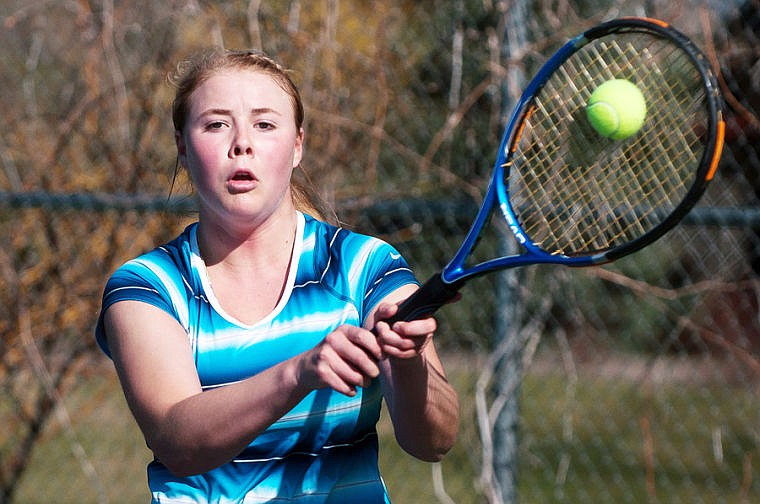 &lt;p&gt;Bigfork's Lana Berg hits a shot Saturday morning during a tennis match at the Bigfork Athletic Club.&lt;/p&gt;