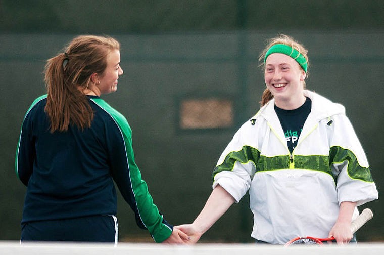 &lt;p&gt;Glacier's Kayla Harwood (left) and Kali Matheson slap hands after a point Friday afternoon during a crosstown tennis match between Glacier and Flathead at Flathead Valley Community Collge. April 18, 2014 in Kalispell, Montana. (Patrick Cote/Daily Inter Lake)&lt;/p&gt;