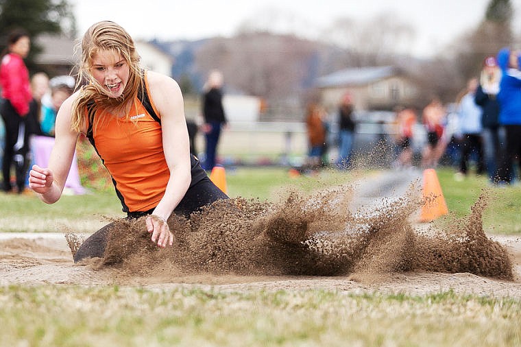 &lt;p&gt;Flathead senior Emma Andrews lands in the sand after a long jump attempt Tuesday afternoon during a track meet at Legends Stadium in Kalispell. April 15, 2014 in Kalispell, Montana. (Patrick Cote/Daily Inter Lake)&lt;/p&gt;