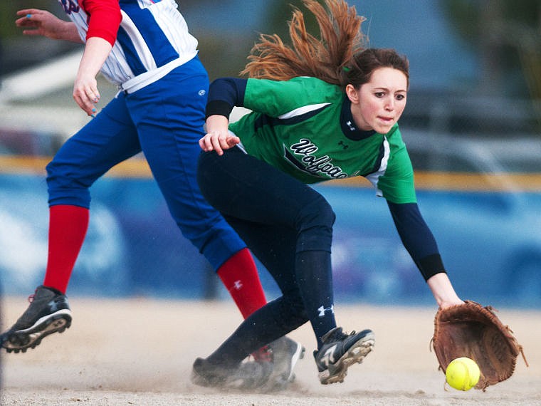 &lt;p&gt;Glacier Kayla Russell fields a ball Friday evening during Columbia Falls' tie with Glacier at Columbia Falls High School. The score was 7-7 when the game was called due to light after nine innings. April 11, 2014 in Kalispell, Montana. (Patrick Cote/Daily Inter Lake)&lt;/p&gt;