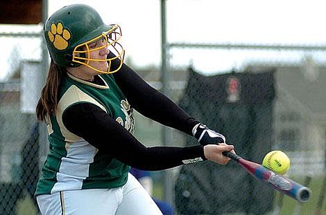 Whitefish senior Shaundra Savage slams a double to drive in two runs in the second inning against Havre Friday afternoon. Whitefish won the opener, 16-14. Jennifer DeMonte photo/Daily Inter Lake